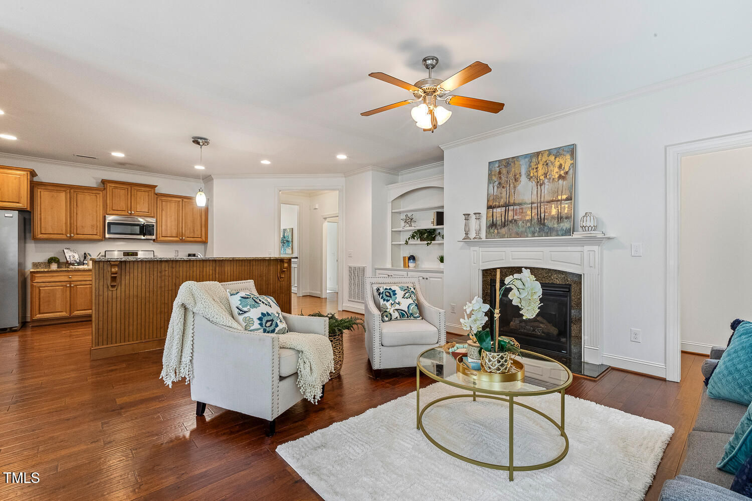 1313 Barnford Mill Road Wake Forest, NC 27587 - Photo 19 of 49 a living room with furniture and kitchen view