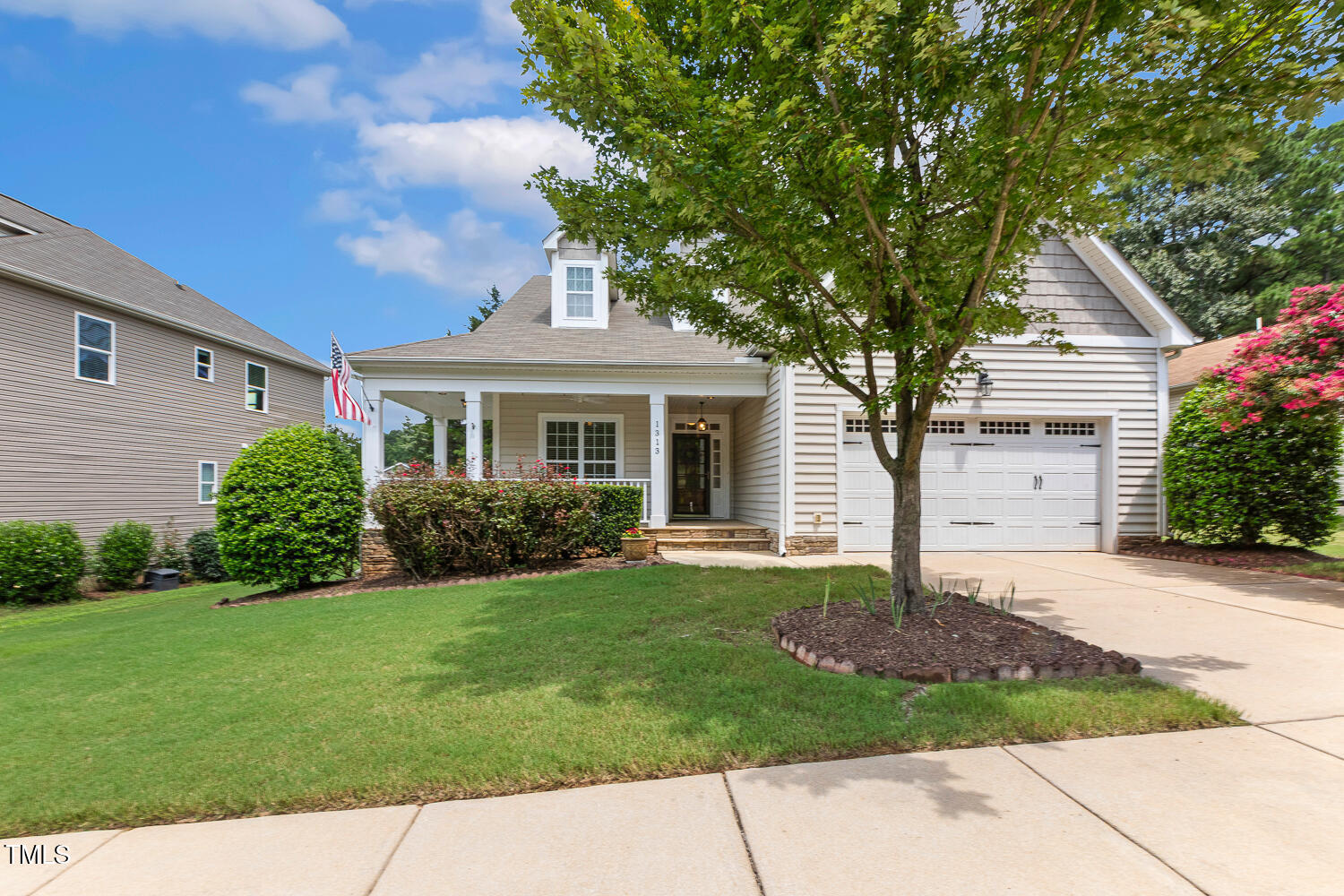 1313 Barnford Mill Road Wake Forest, NC 27587 - Photo 2 of 49 a front view of a house with a yard
