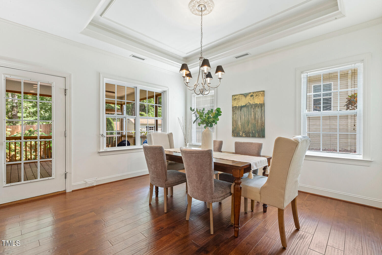1313 Barnford Mill Road Wake Forest, NC 27587 - Photo 22 of 49 a view of a dining room with furniture window and wooden floor