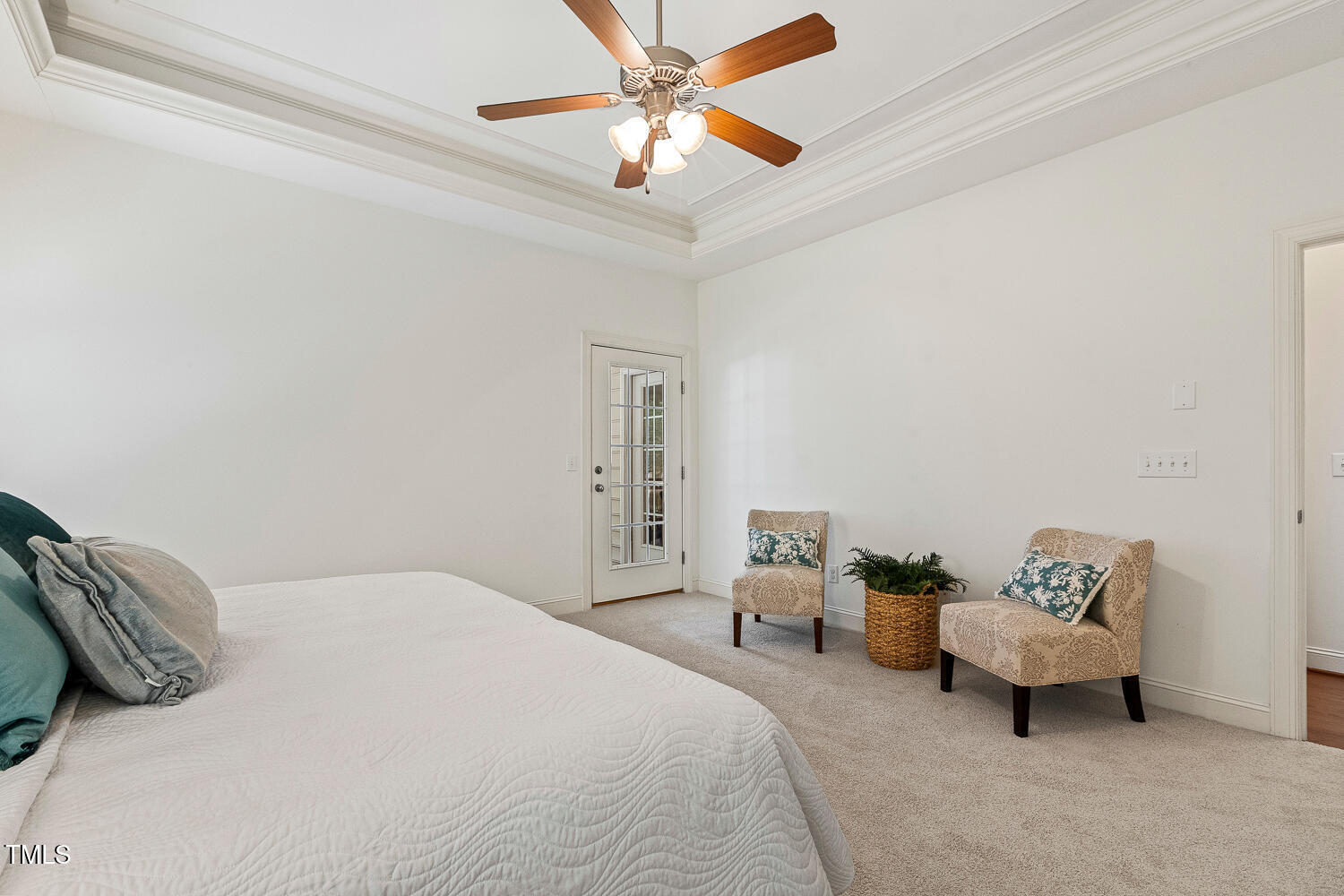 1313 Barnford Mill Road Wake Forest, NC 27587 - Photo 29 of 49 a bedroom with a bed and a chandelier fan