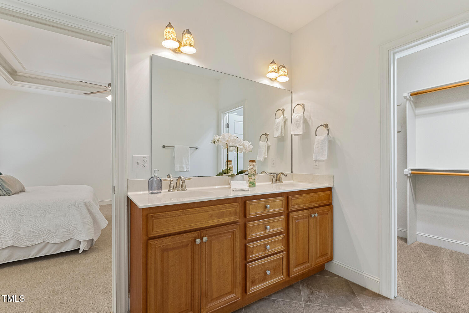 1313 Barnford Mill Road Wake Forest, NC 27587 - Photo 30 of 49 a bathroom with a sink double vanity and a mirror