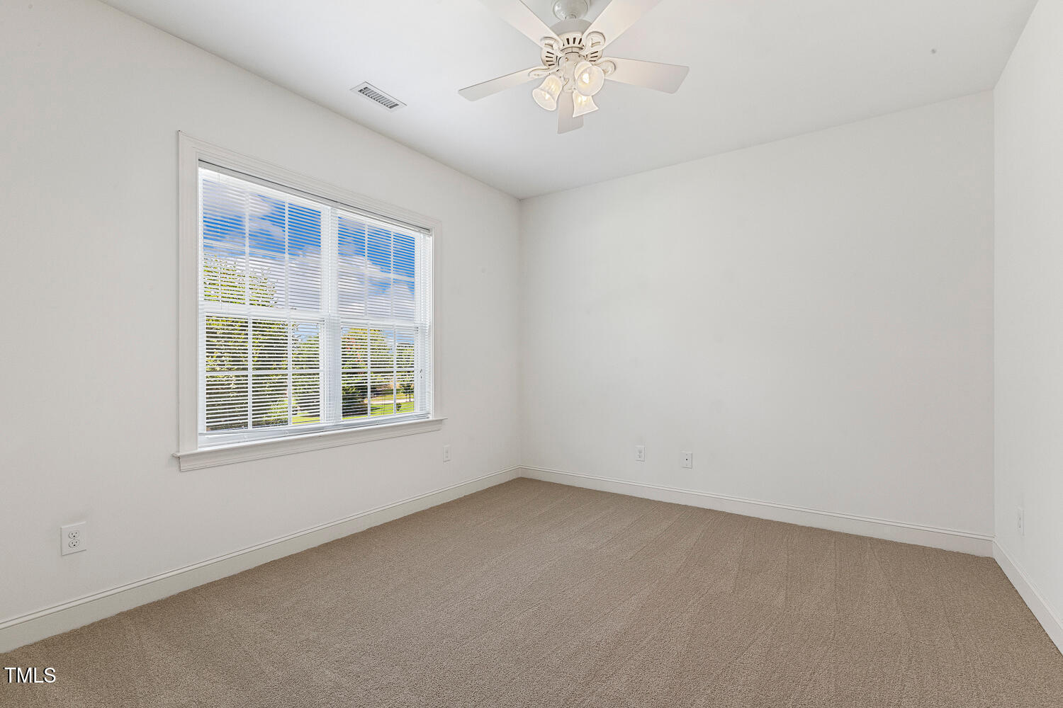 1313 Barnford Mill Road Wake Forest, NC 27587 - Photo 34 of 49 an empty room with a window
