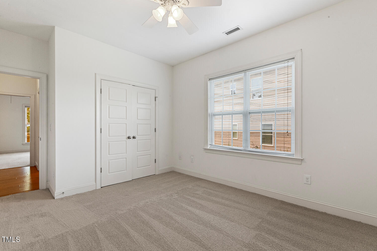 1313 Barnford Mill Road Wake Forest, NC 27587 - Photo 35 of 49 an empty room with chandelier fan