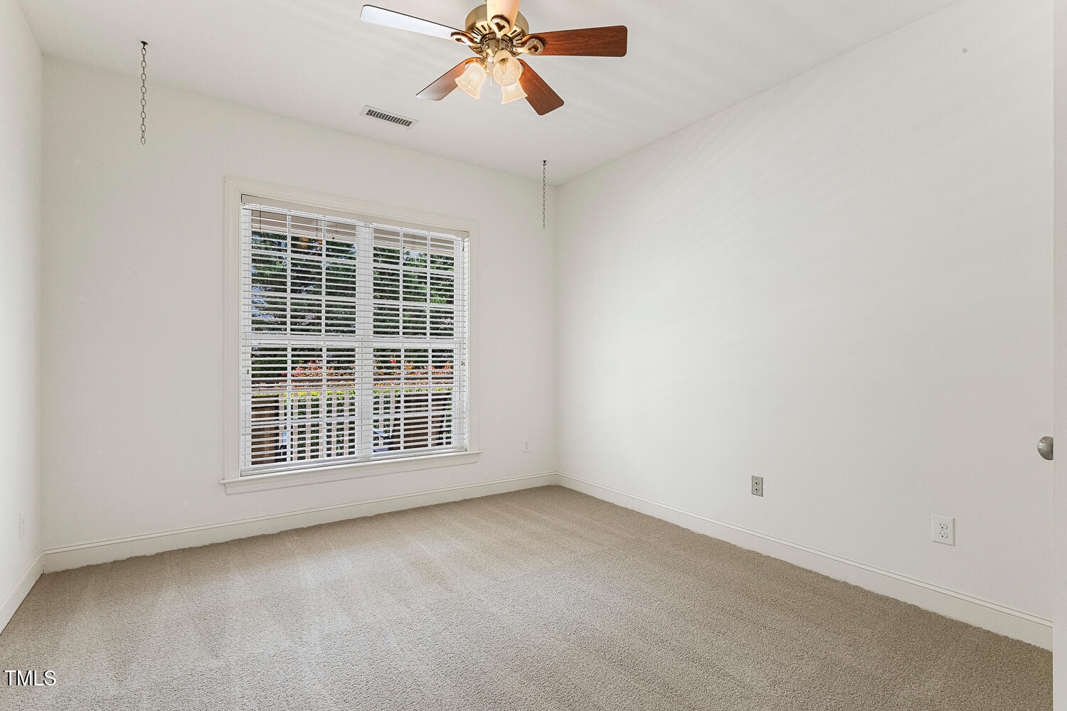 1313 Barnford Mill Road Wake Forest, NC 27587 - Photo 37 of 49 a view of an empty room with a window