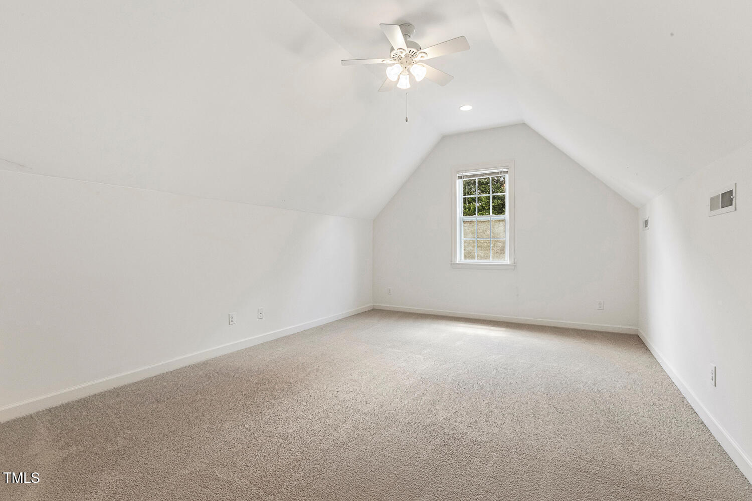 1313 Barnford Mill Road Wake Forest, NC 27587 - Photo 39 of 49 an empty room with a window and ceiling fan
