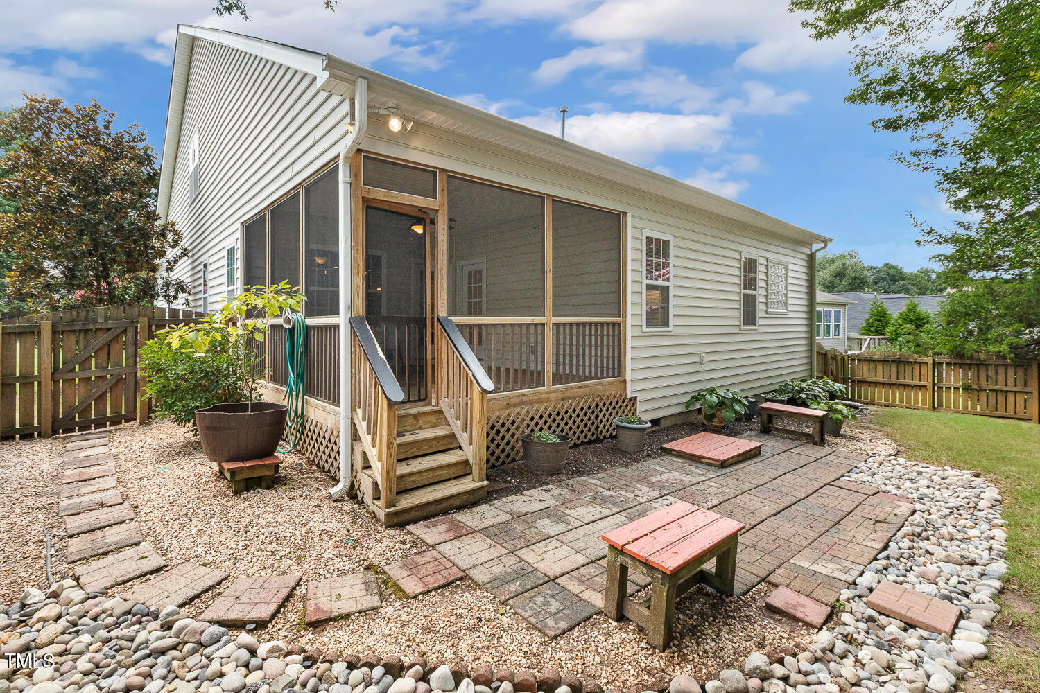 1313 Barnford Mill Road Wake Forest, NC 27587 - Photo 47 of 49 a view of a patio with two chairs and a table