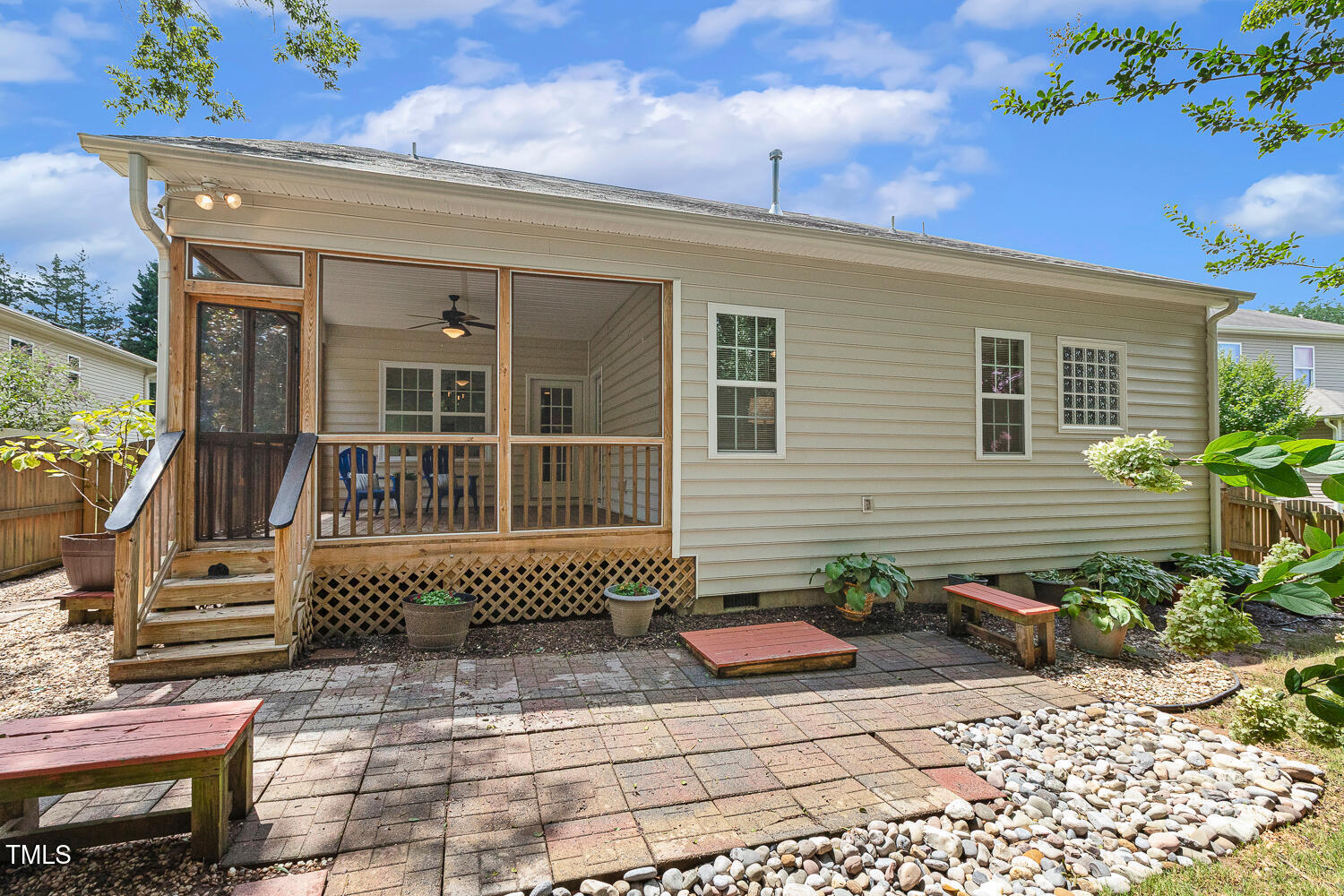 1313 Barnford Mill Road Wake Forest, NC 27587 - Photo 48 of 49 a front view of a house with a garden