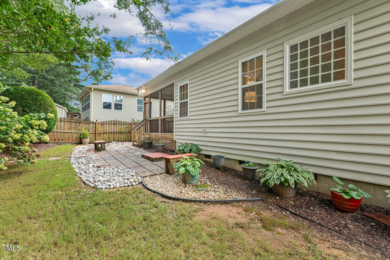 1313 Barnford Mill Road Wake Forest, NC 27587 - Photo 49 of 49 a view of a house with backyard and sitting area