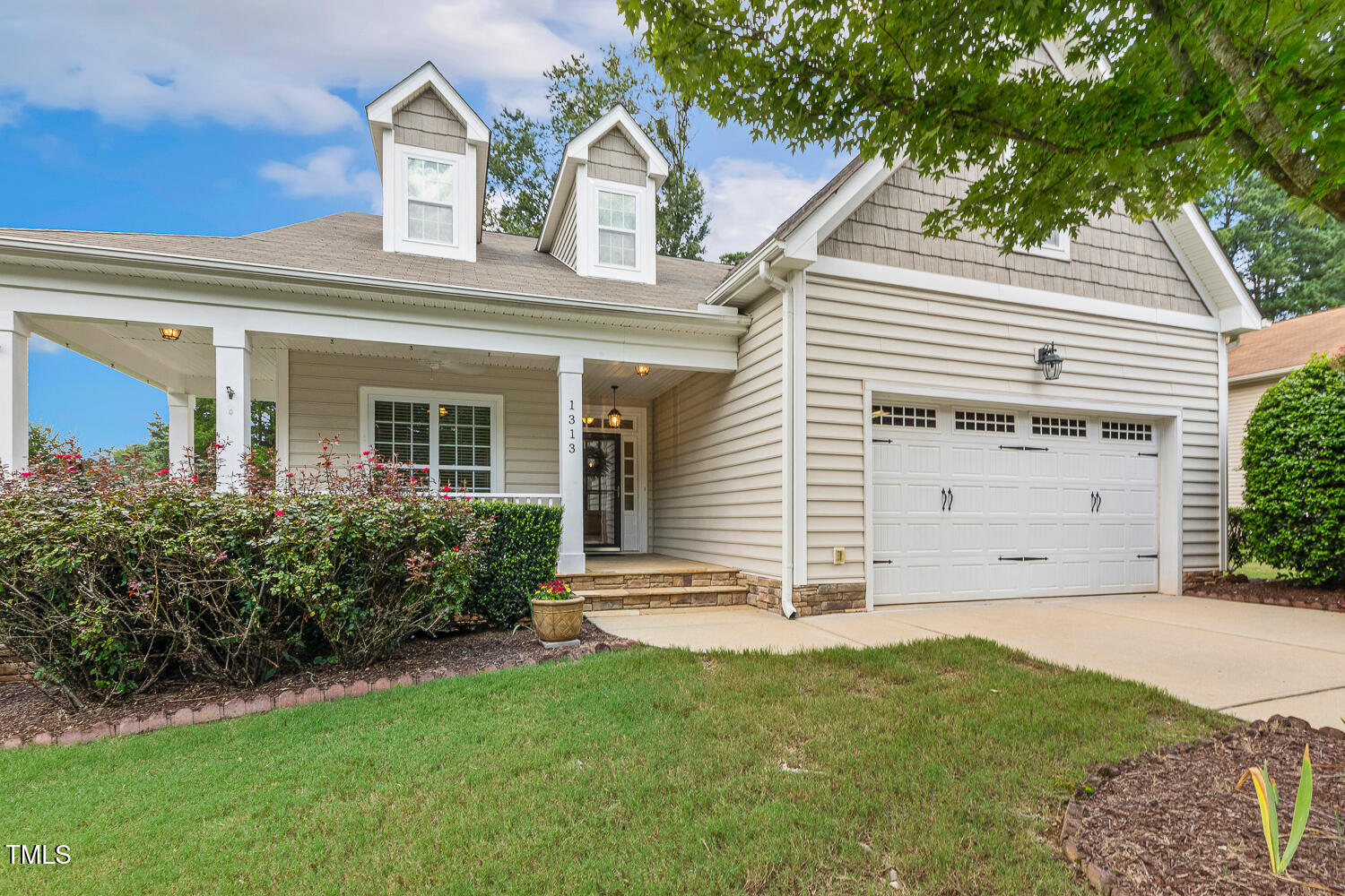 1313 Barnford Mill Road Wake Forest, NC 27587 - Photo 5 of 49 a front view of a house with a yard