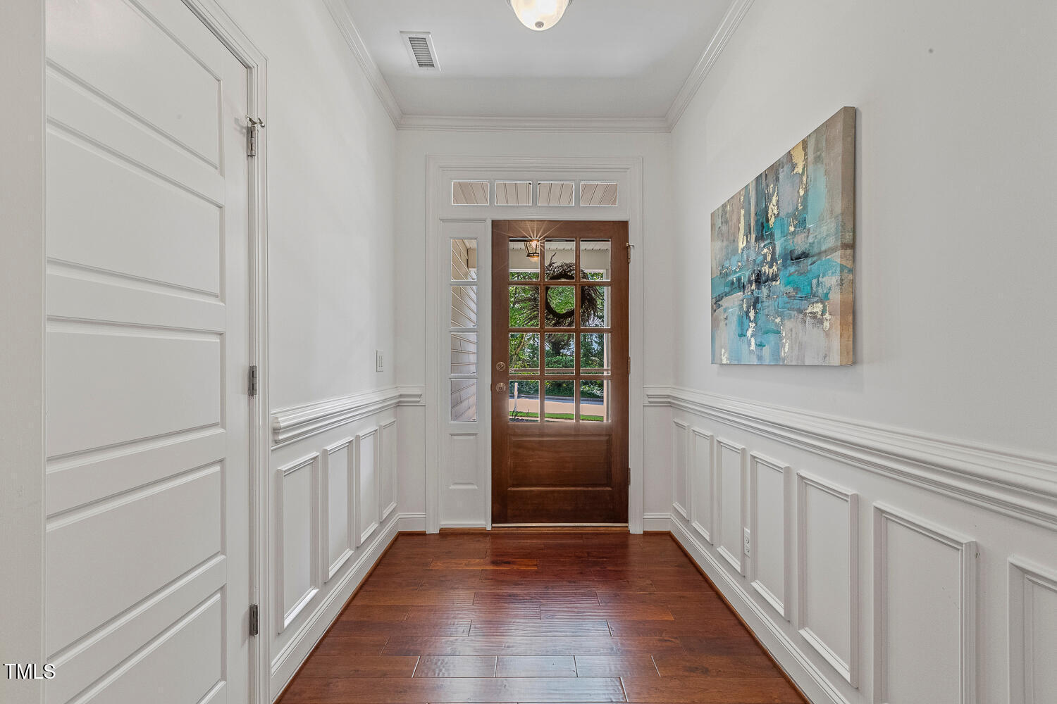 1313 Barnford Mill Road Wake Forest, NC 27587 - Photo 8 of 49 a view of an entryway door with wooden floor
