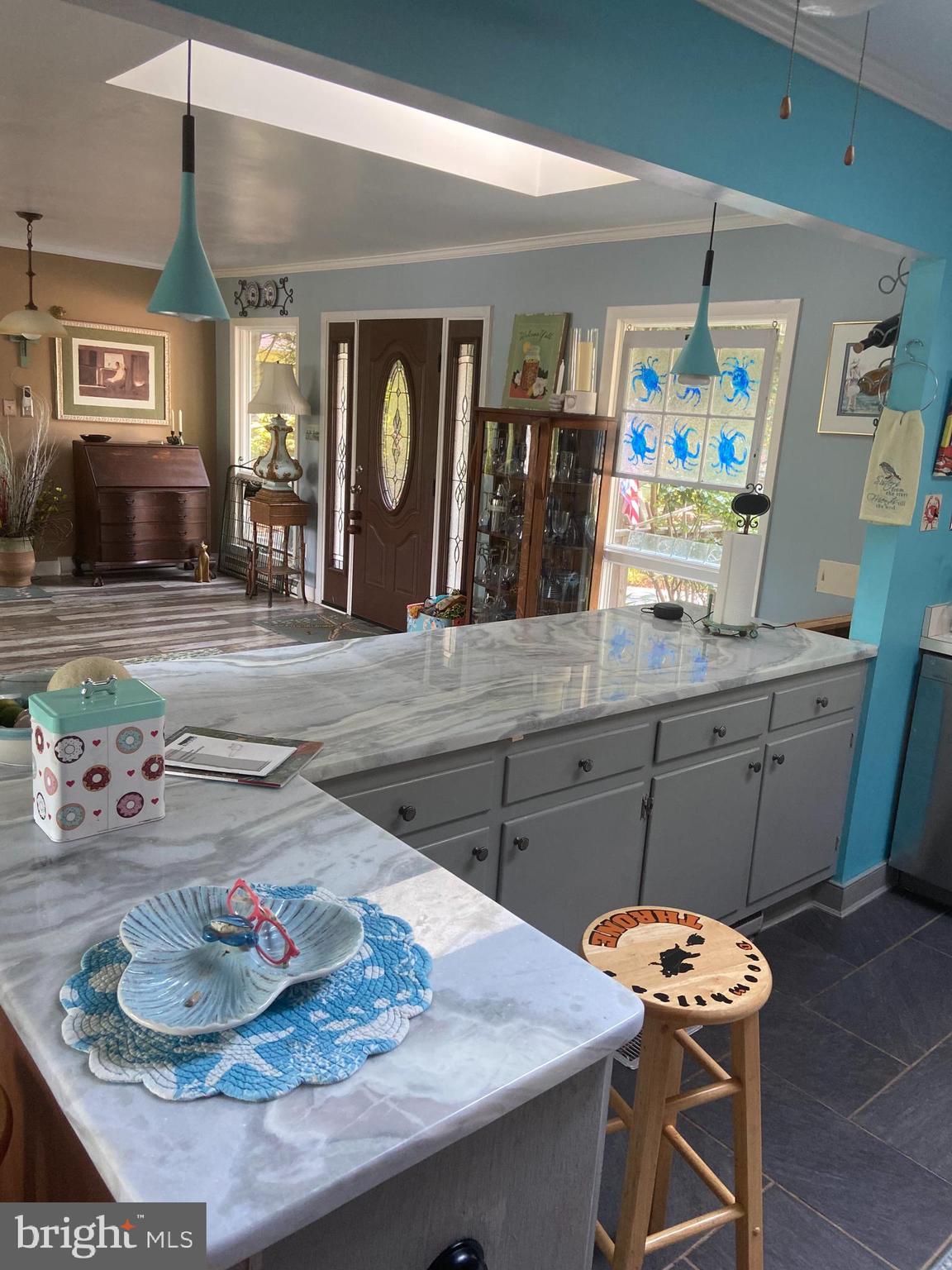 152 Swann Court Reedville, VA 22539 - Photo 16 of 33 a kitchen with a table and chairs in it