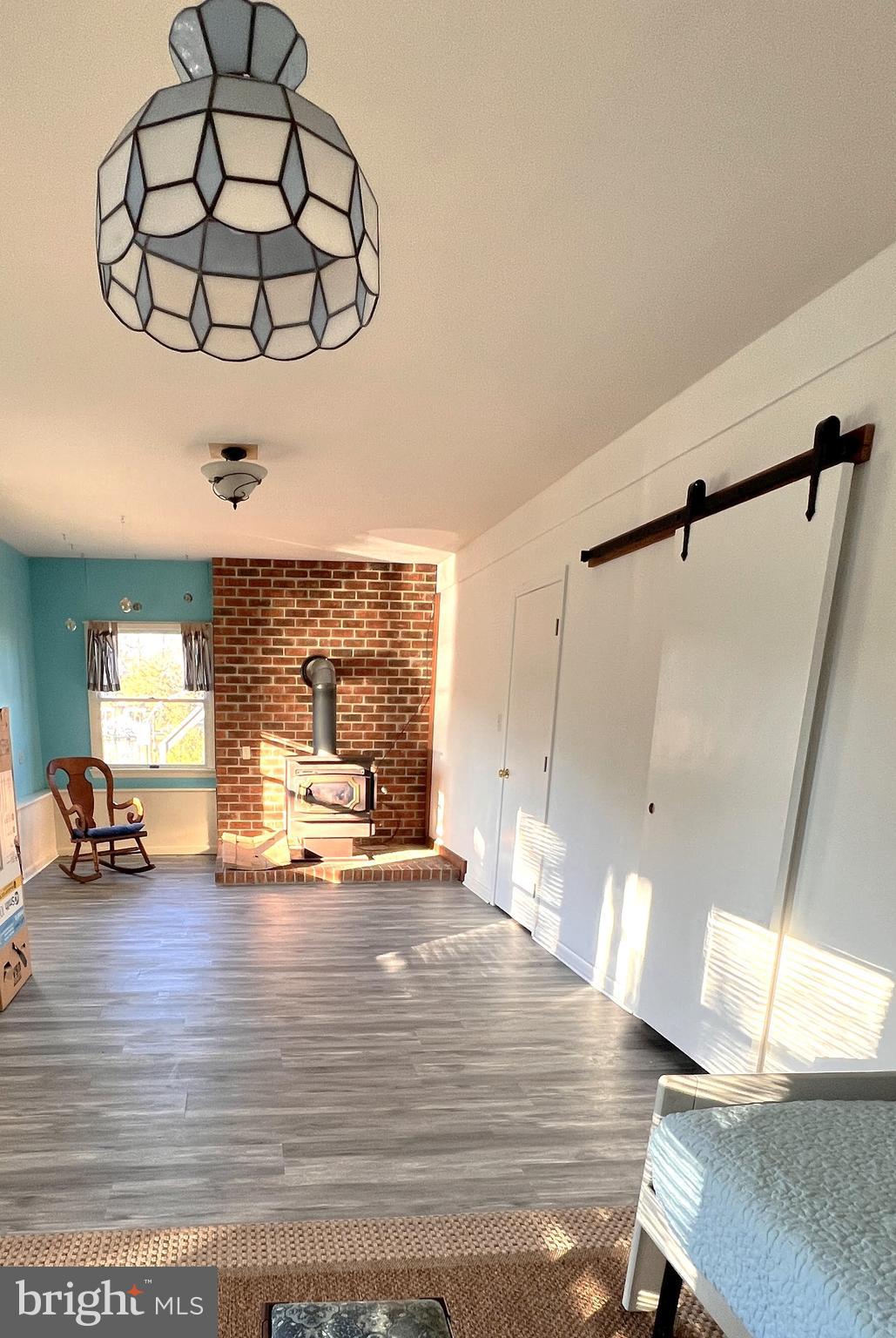 152 Swann Court Reedville, VA 22539 - Photo 25 of 33 a view of a dining room with furniture window and wooden floor