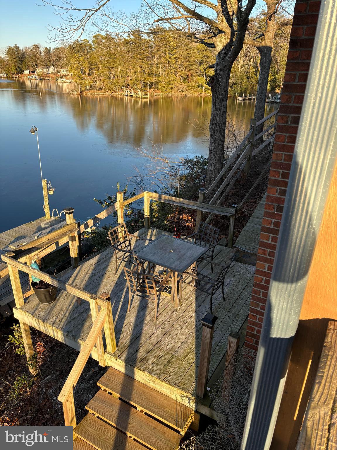 152 Swann Court Reedville, VA 22539 - Photo 29 of 33 a view of a lake from a balcony