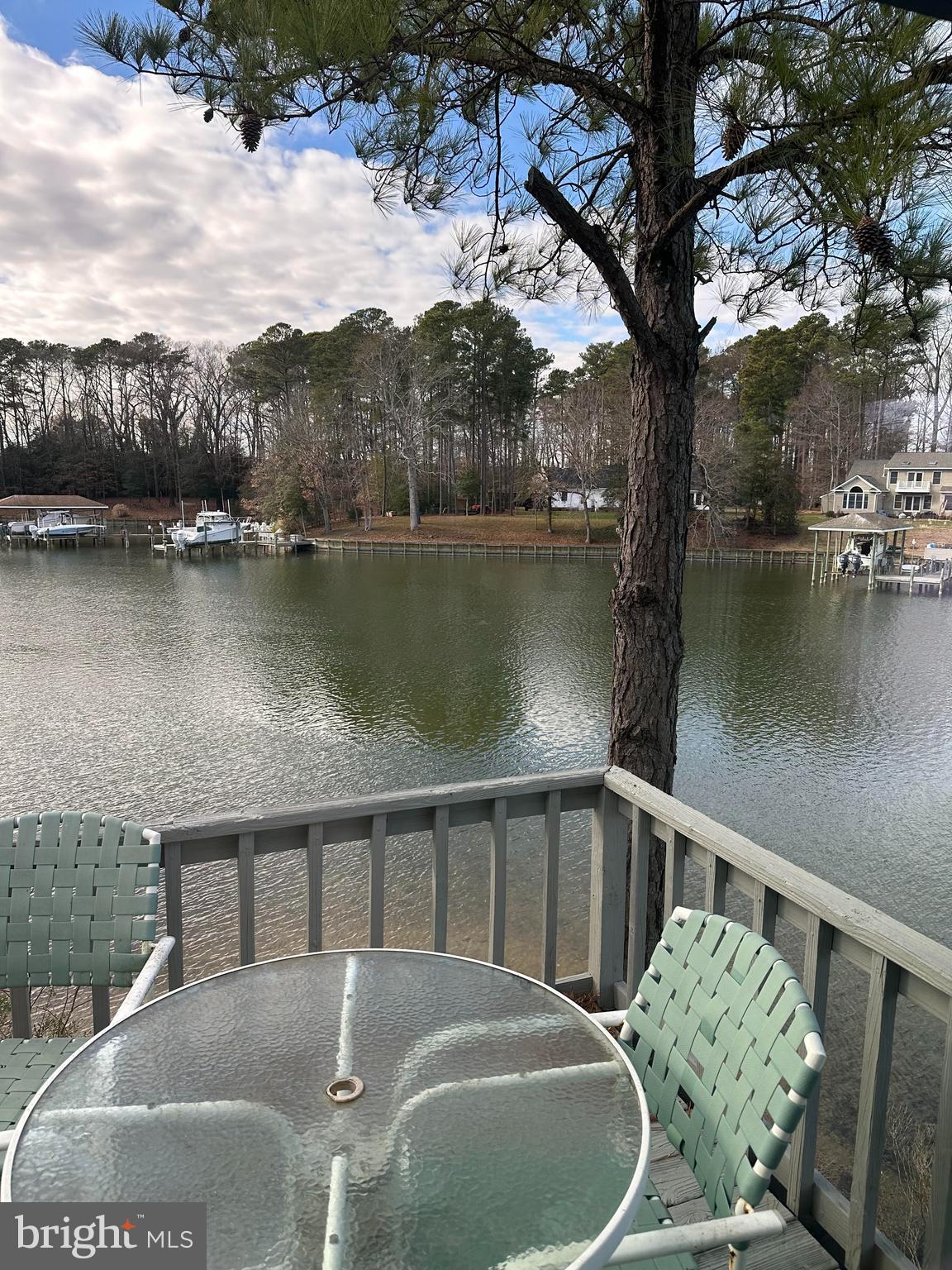 152 Swann Court Reedville, VA 22539 - Photo 7 of 33 a view of a lake from a balcony