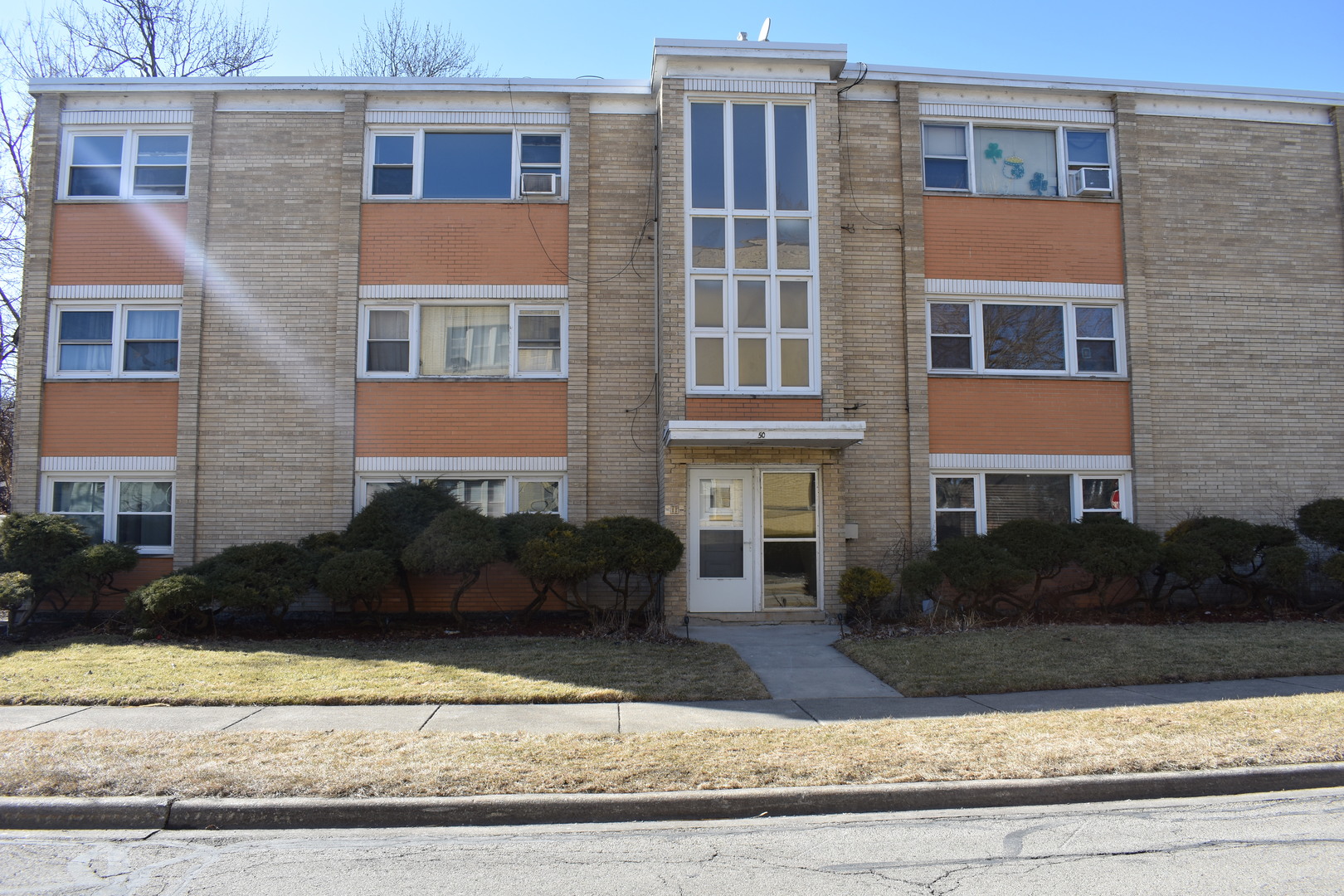 50 West Avenue, Unit 1S Riverside, IL 60546 - Photo 1 of 20 a front view of a house with a yard
