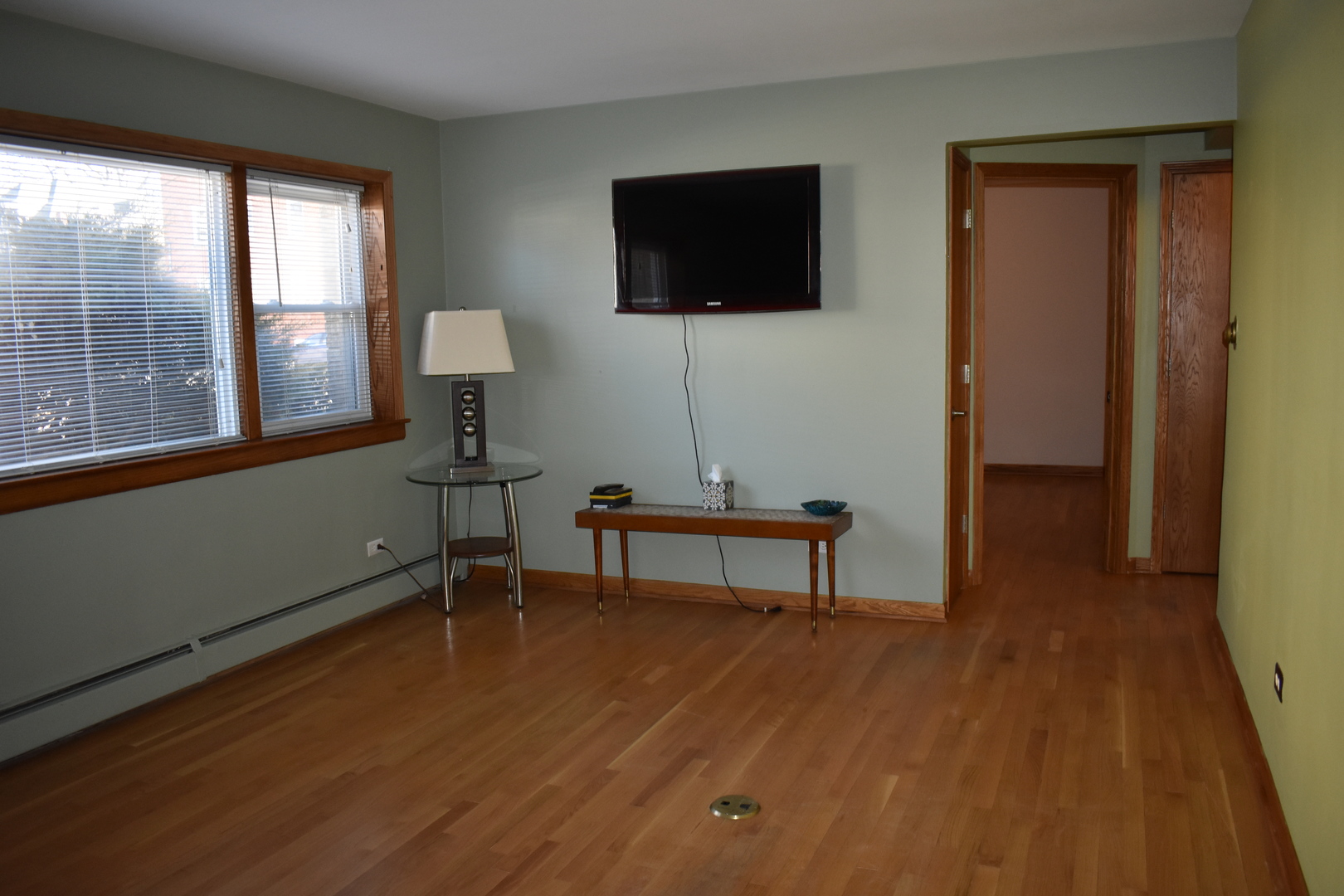 50 West Avenue, Unit 1S Riverside, IL 60546 - Photo 4 of 20 a living room with furniture and a flat screen tv