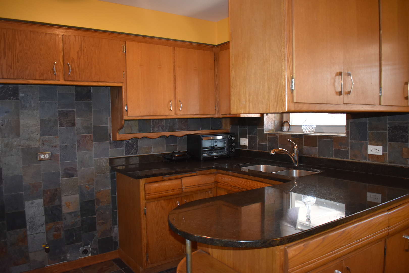 50 West Avenue, Unit 1S Riverside, IL 60546 - Photo 10 of 20 a kitchen with a sink and cabinets