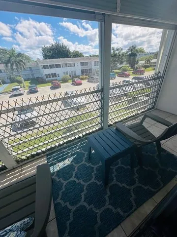 a view of a balcony with an outdoor space