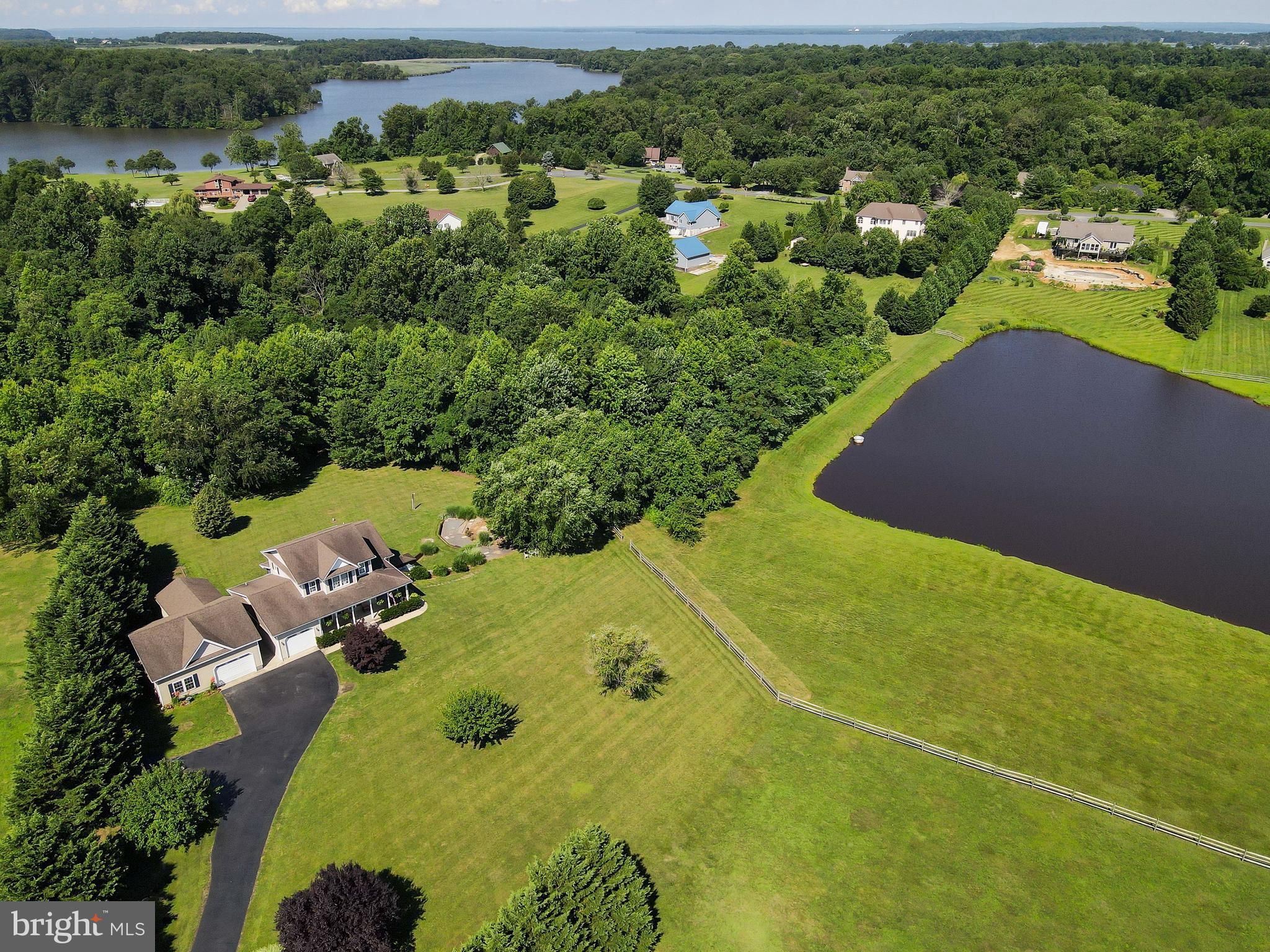 180 Clemencia Road Earleville, MD 21919 - Photo 4 of 56 Community Pond Views, Tree line