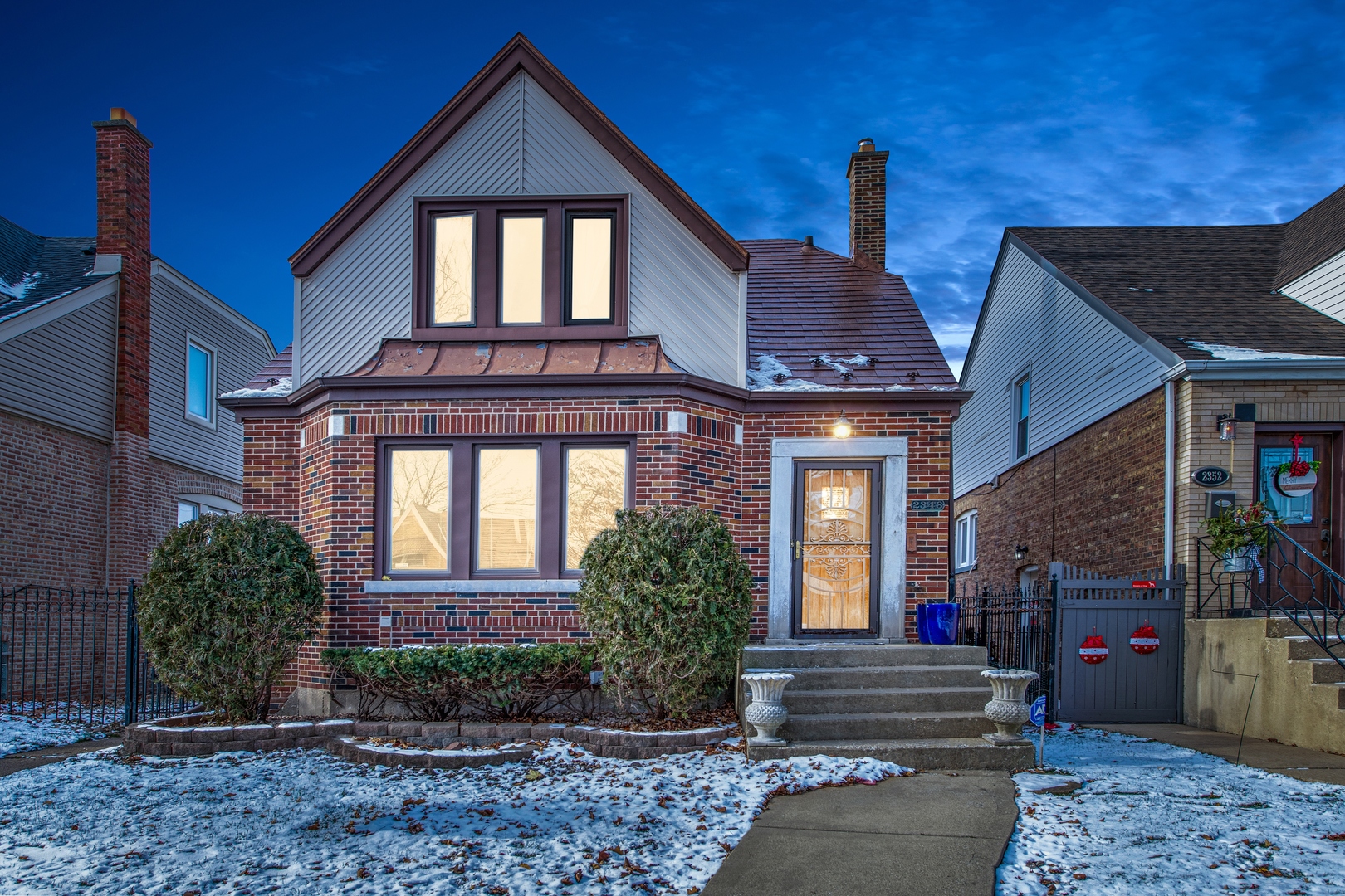 2348 North Rutherford Avenue Chicago, IL 60707 - Photo 1 of 16 a front view of a house with a yard