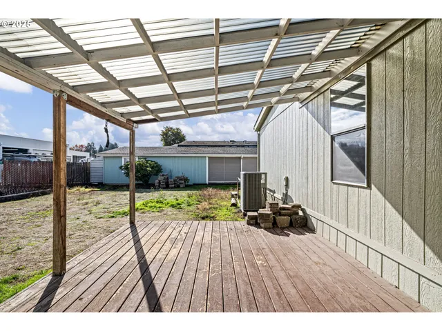 a view of swimming pool with a patio