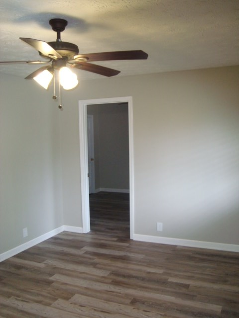 6228 Potomac Circle Columbus, GA 31909 - Photo 2 of 16 a view of an empty room and wooden floor
