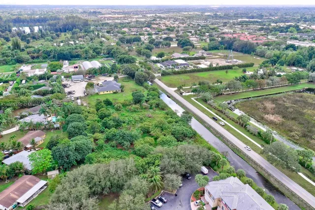 an aerial view of a city with lots of residential buildings
