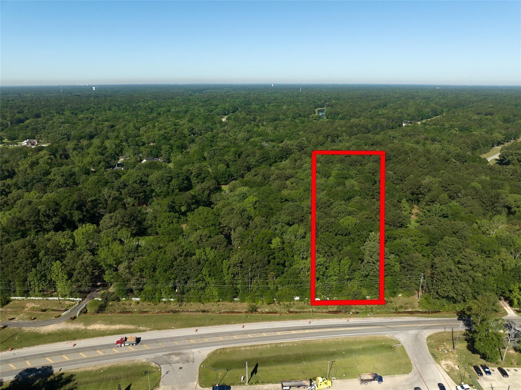 29325 Huffman Cleveland Road Huffman, TX 77336 - Photo 5 of 6 a view of a yard with a swimming pool