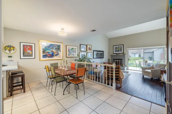 a view of a dining room with furniture window and outside view
