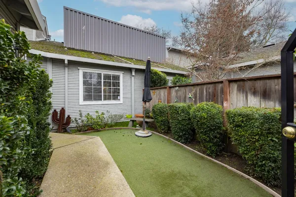 an aerial view of a house with a garden