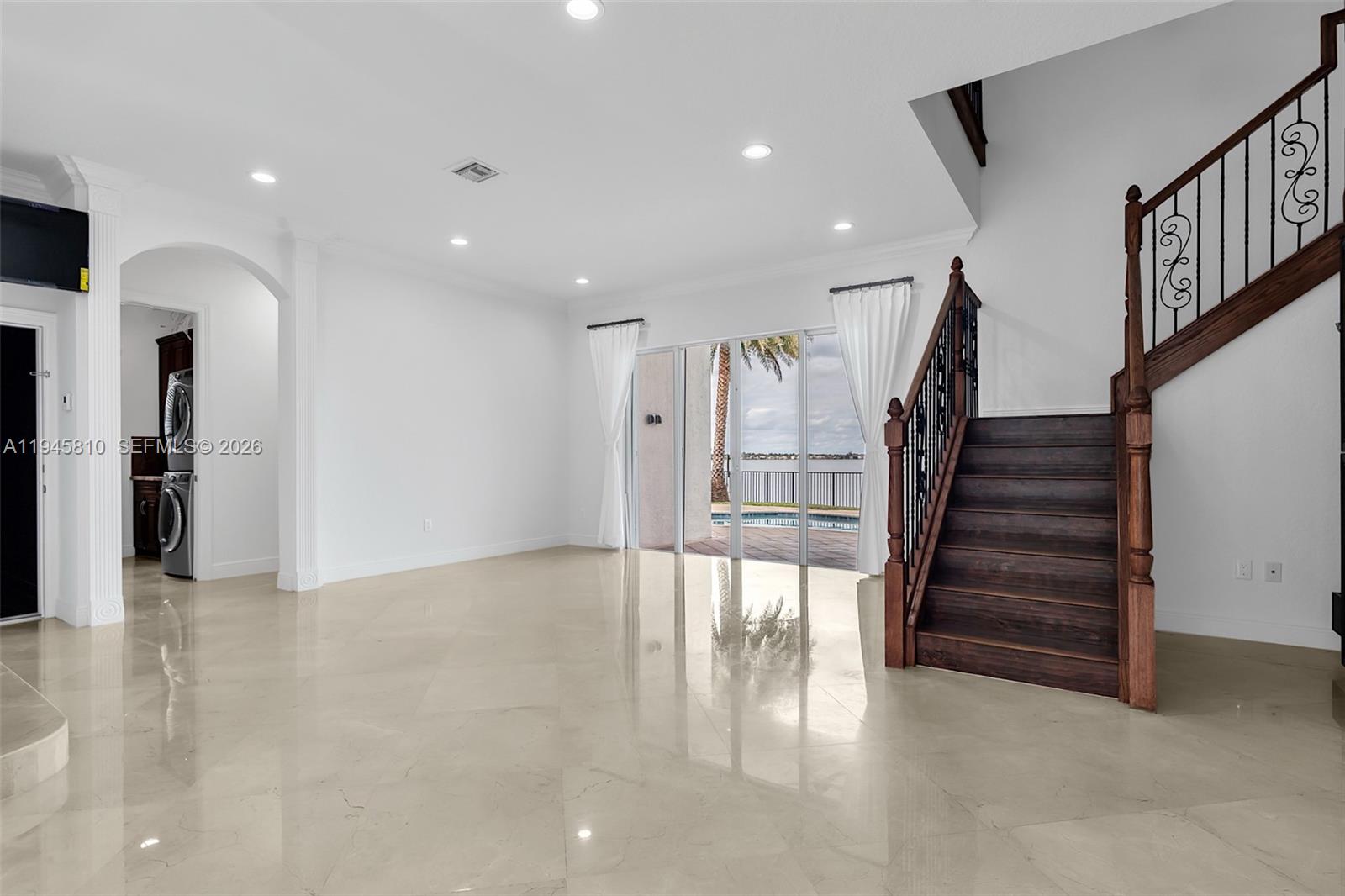 17809 Southwest 54th Street Miramar, FL 33029 - Photo 12 of 94 a view of entryway with stairs and wooden floor