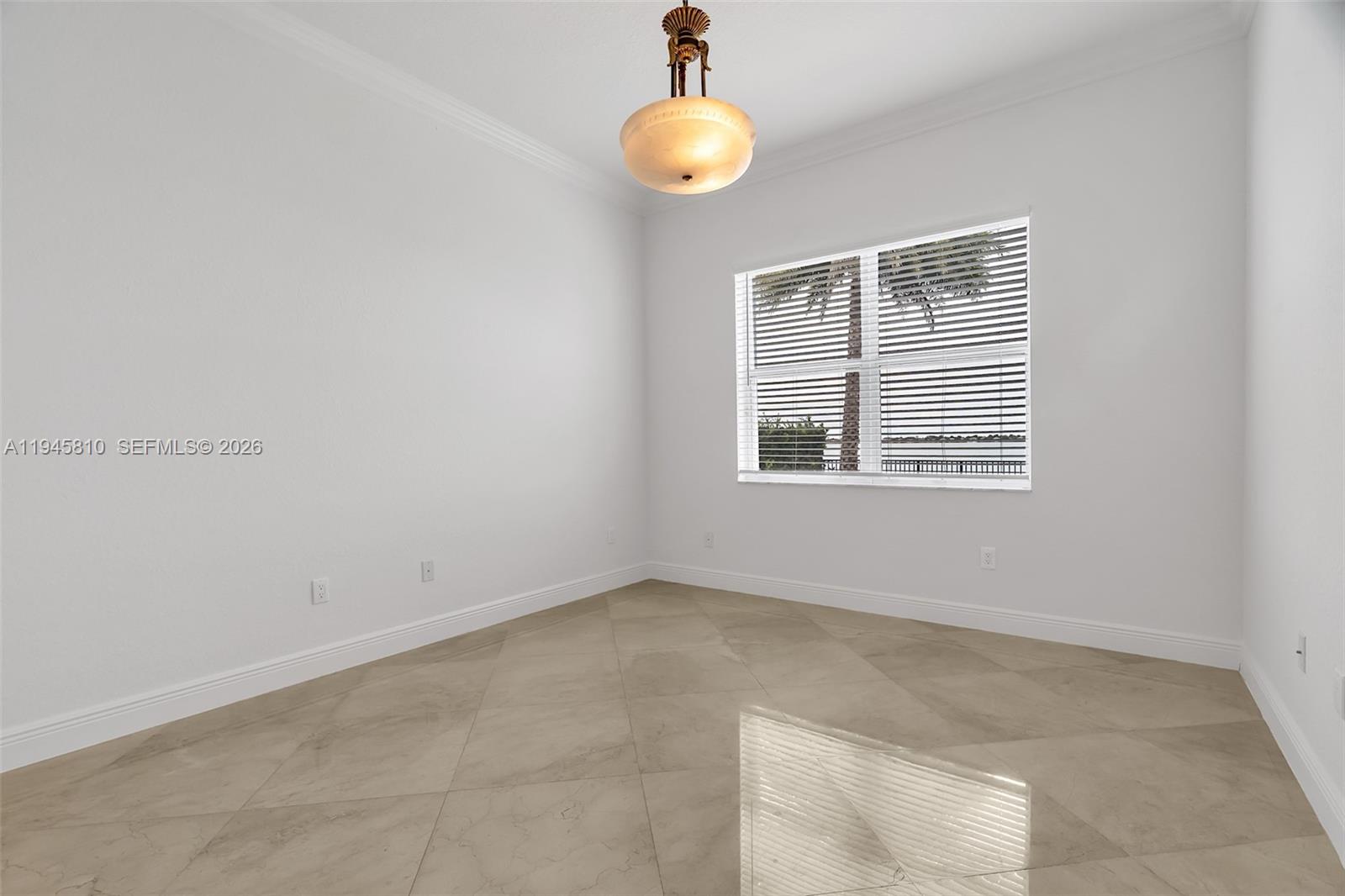 17809 Southwest 54th Street Miramar, FL 33029 - Photo 18 of 94 a view of an empty room with a window