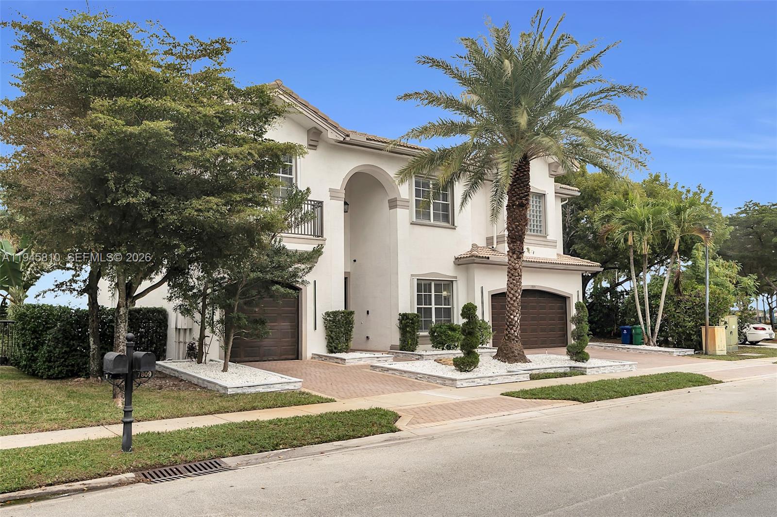 17809 Southwest 54th Street Miramar, FL 33029 - Photo 3 of 94 a view of a white house with a large tree