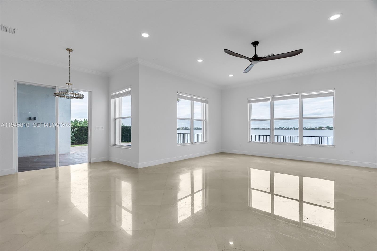 17809 Southwest 54th Street Miramar, FL 33029 - Photo 32 of 94 a view of an empty room with a window and a kitchen