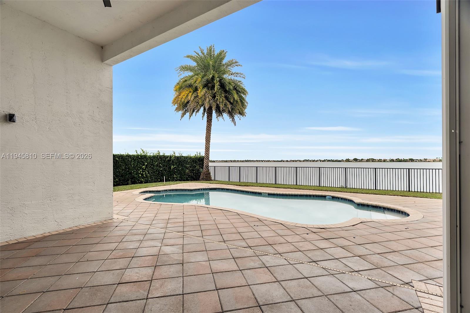 17809 Southwest 54th Street Miramar, FL 33029 - Photo 36 of 94 a view of swimming pool with an outdoor space and seating area