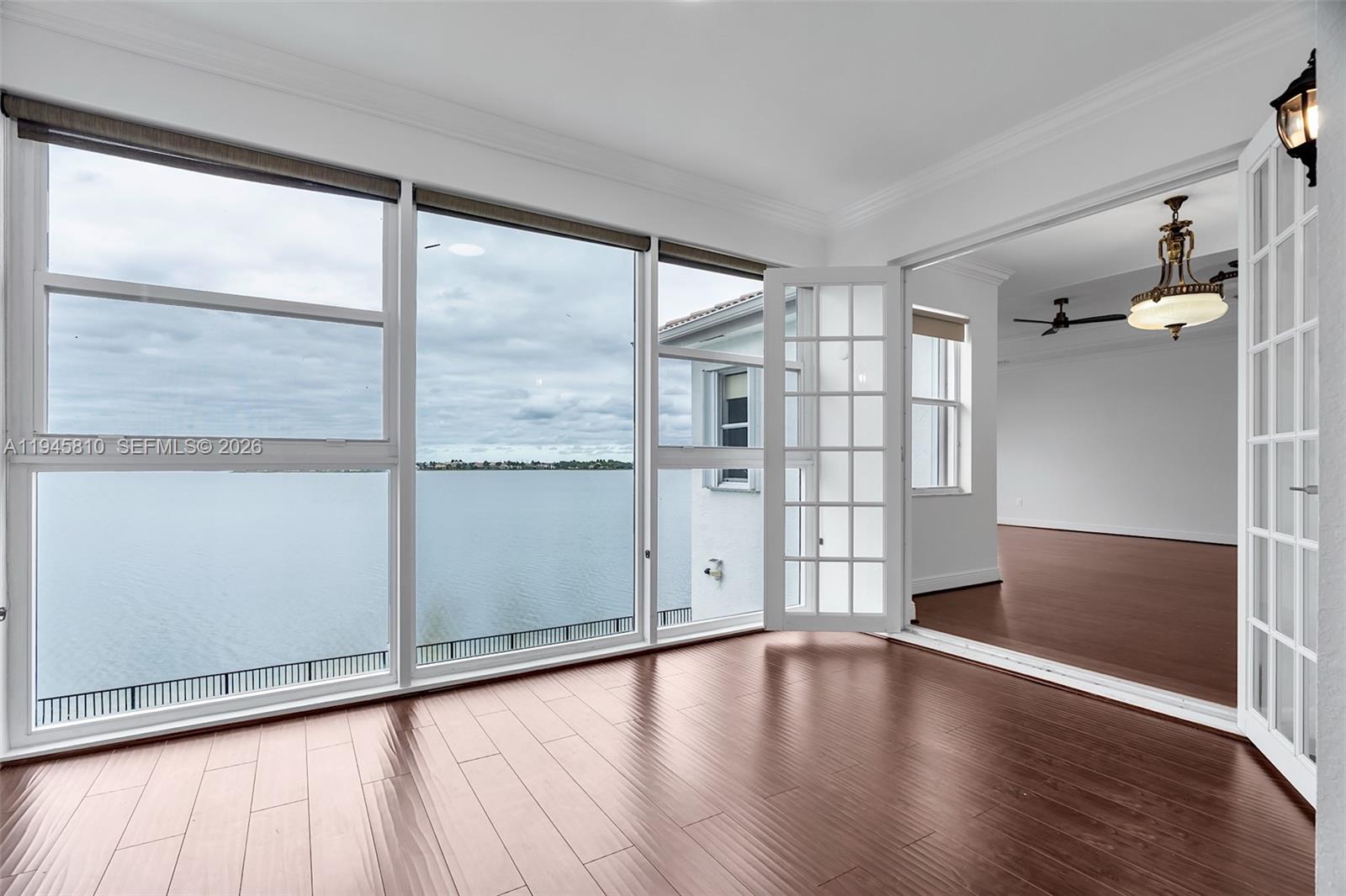 17809 Southwest 54th Street Miramar, FL 33029 - Photo 43 of 94 a view of empty room with wooden floor and fan