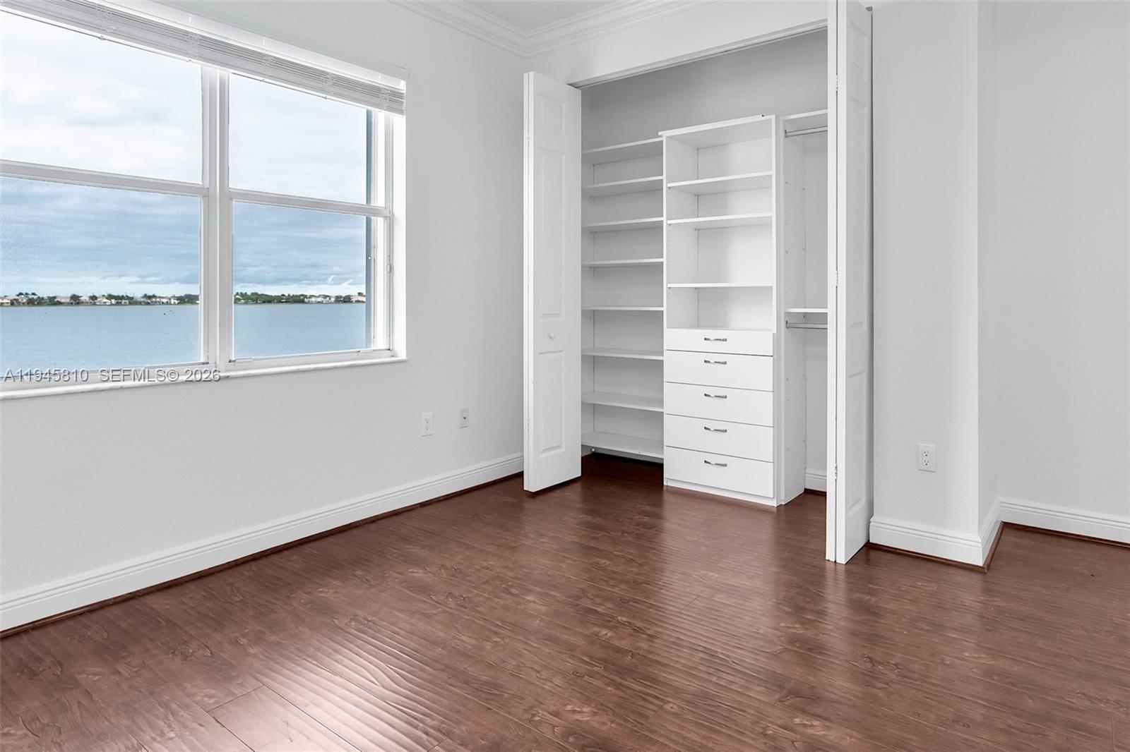 17809 Southwest 54th Street Miramar, FL 33029 - Photo 65 of 94 wooden floor in an empty room with a window