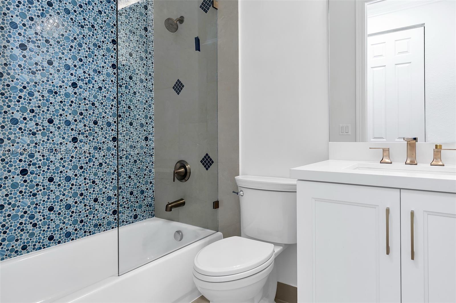 17809 Southwest 54th Street Miramar, FL 33029 - Photo 72 of 94 a bathroom with a sink toilet and shower