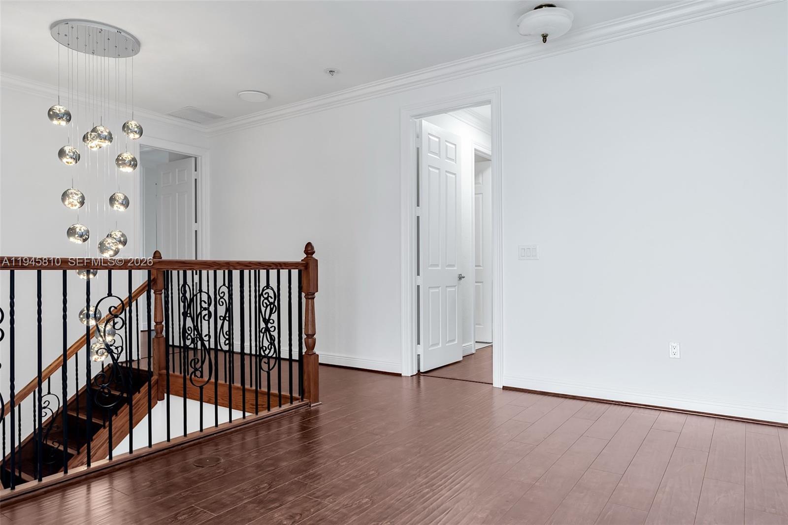 17809 Southwest 54th Street Miramar, FL 33029 - Photo 75 of 94 wooden floor in a hall with a window