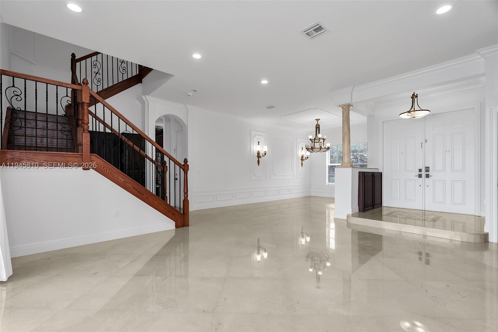 17809 Southwest 54th Street Miramar, FL 33029 - Photo 8 of 94 a view of a hallway with wooden floor and staircase