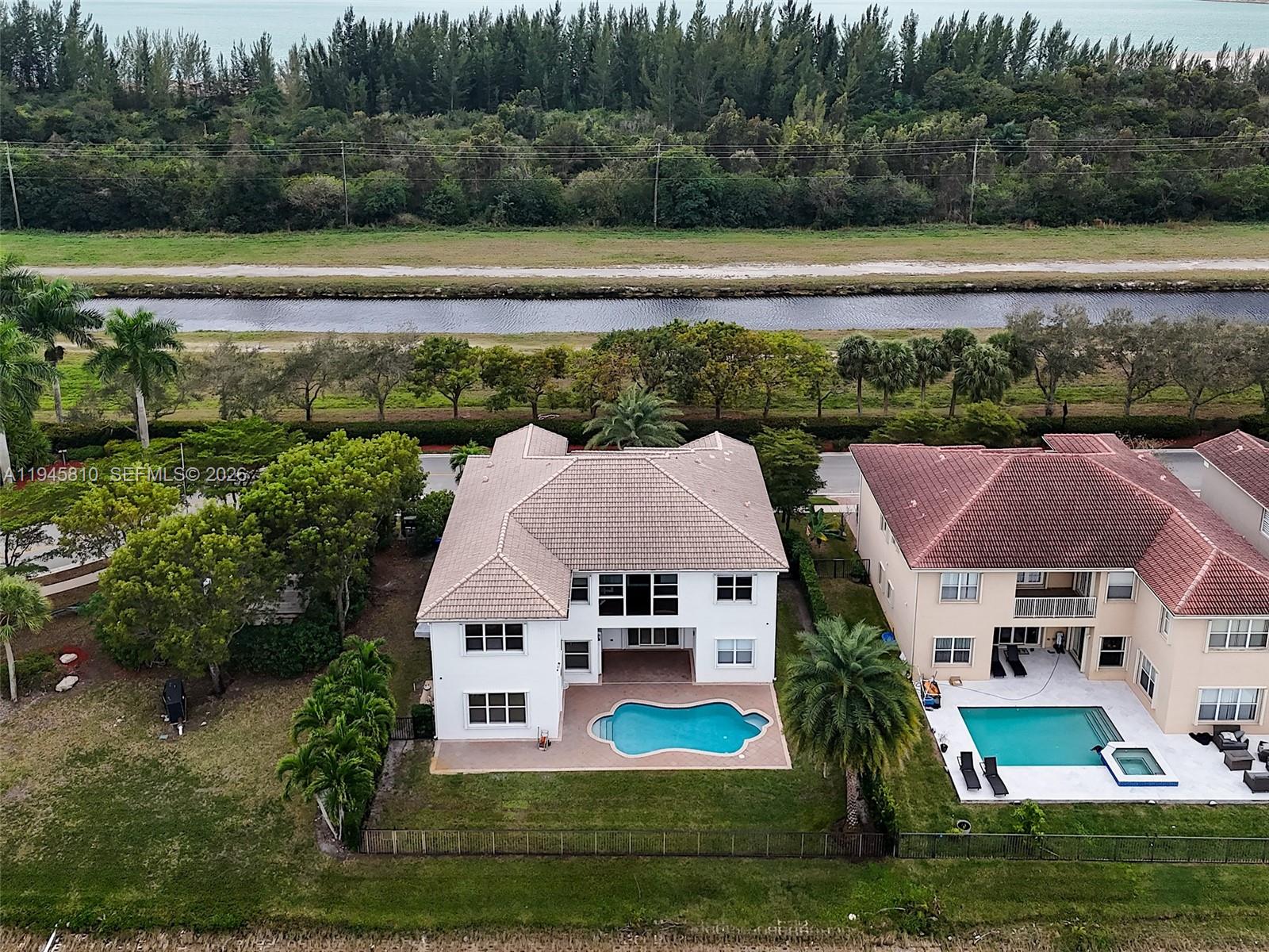 17809 Southwest 54th Street Miramar, FL 33029 - Photo 81 of 94 an aerial view of a house with a big yard