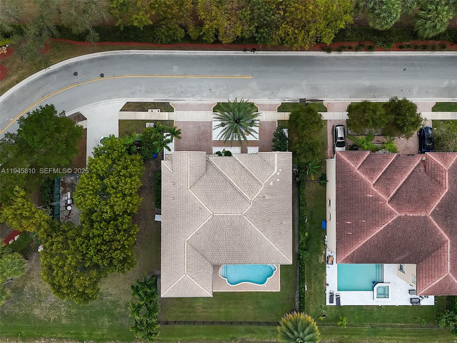 17809 Southwest 54th Street Miramar, FL 33029 - Photo 82 of 94 an aerial view of a house with outdoor space and a lake view