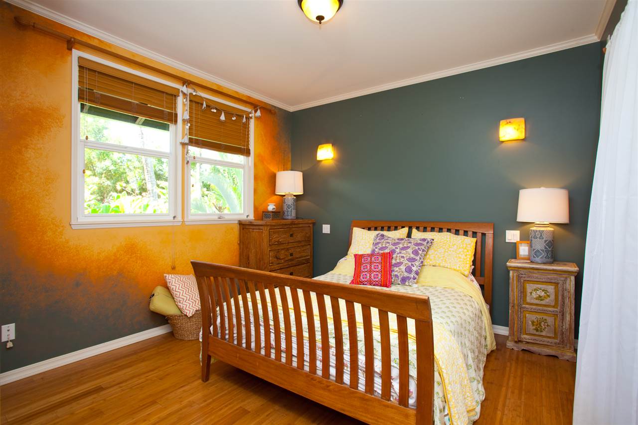 160 Nahele Road Haiku, HI 96708 - Photo 20 of 30 a bedroom with a bed and a window