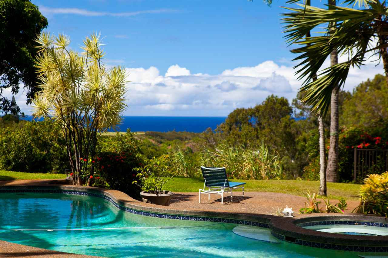 160 Nahele Road Haiku, HI 96708 - Photo 28 of 30 a view of a swimming pool with a yard