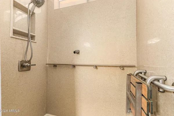 a view of a room with rack on the wall