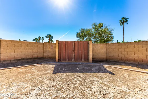 a view of a swimming pool with an ocean view