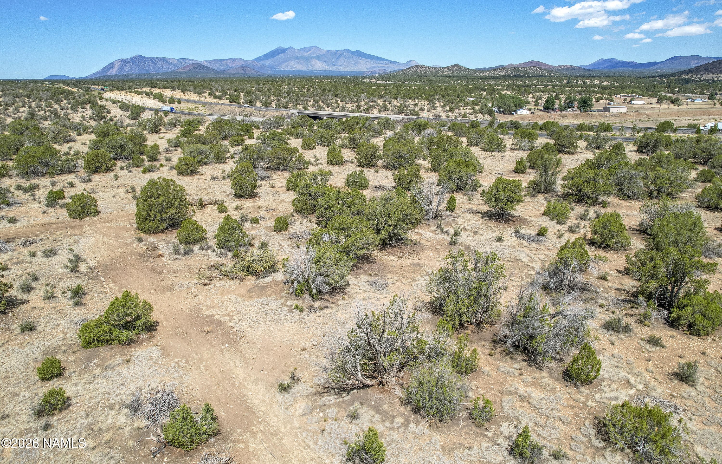 7.85 Acres Parcel Road Flagstaff, AZ 86004 - Photo 14 of 20 Drone looking West to SF Peaks
