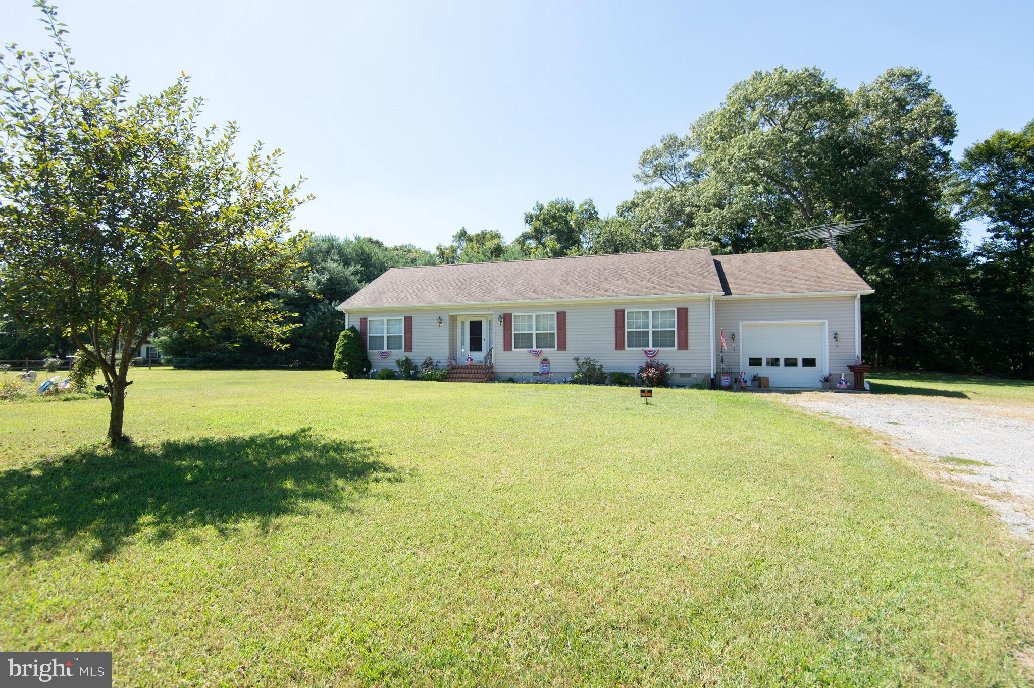 5834 Bell Creek Road Preston, MD 21655 - Photo 3 of 44 a front view of house with yard and green space