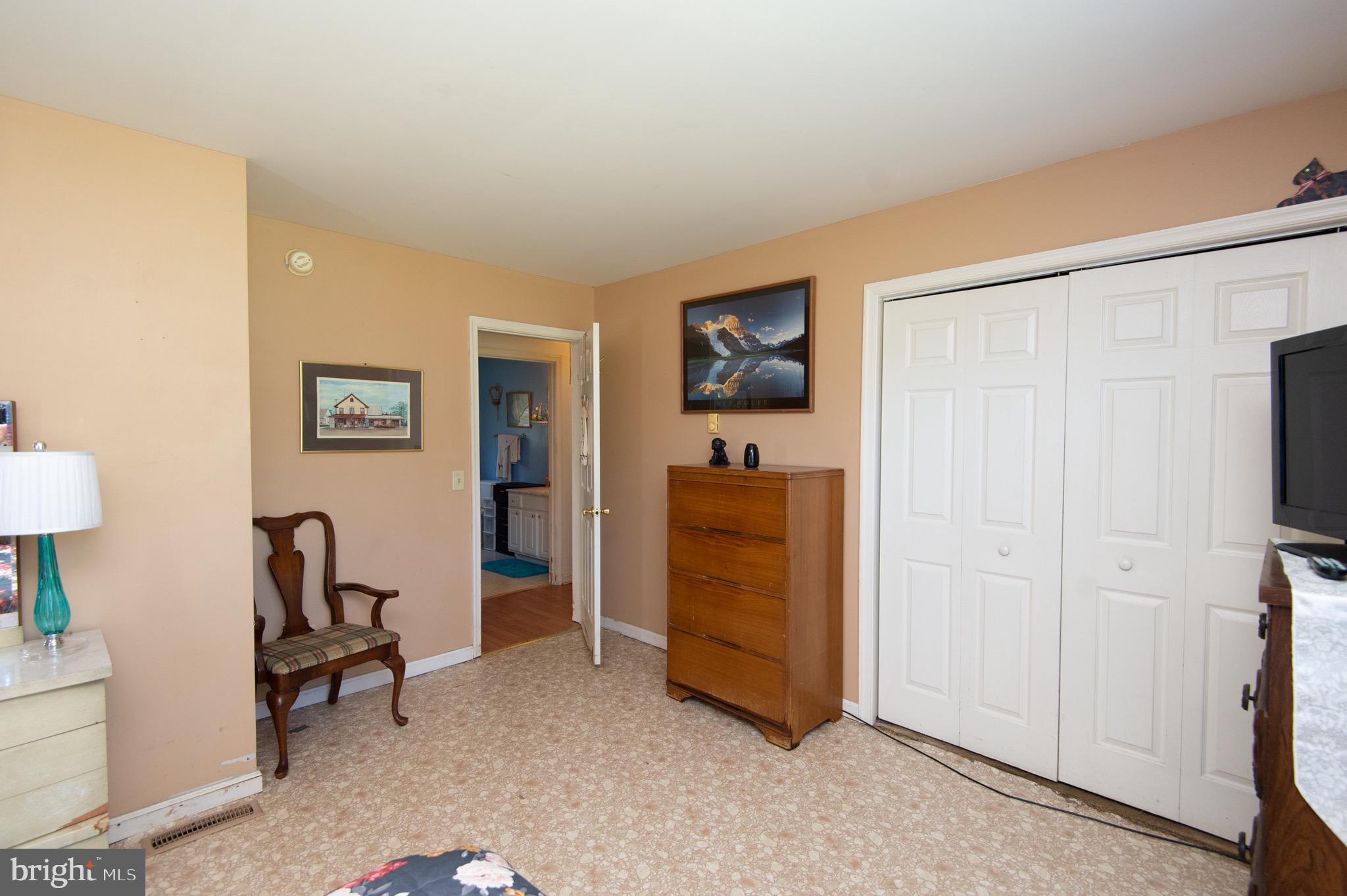 5834 Bell Creek Road Preston, MD 21655 - Photo 22 of 44 a view of a livingroom with furniture and a flat screen tv