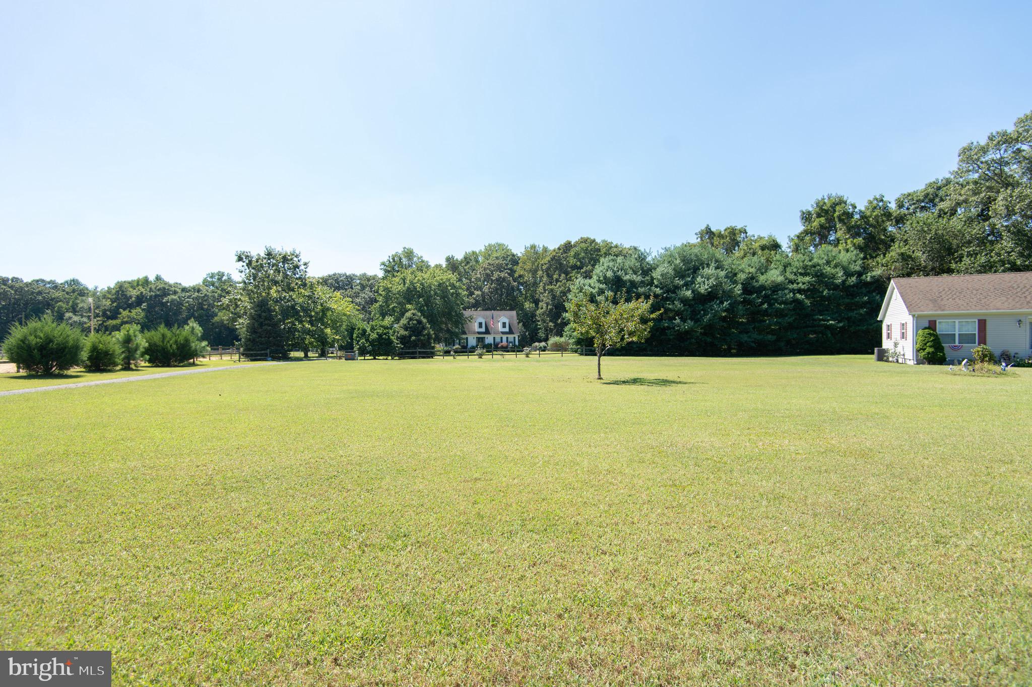 5834 Bell Creek Road Preston, MD 21655 - Photo 42 of 44 a view of a lake with a yard